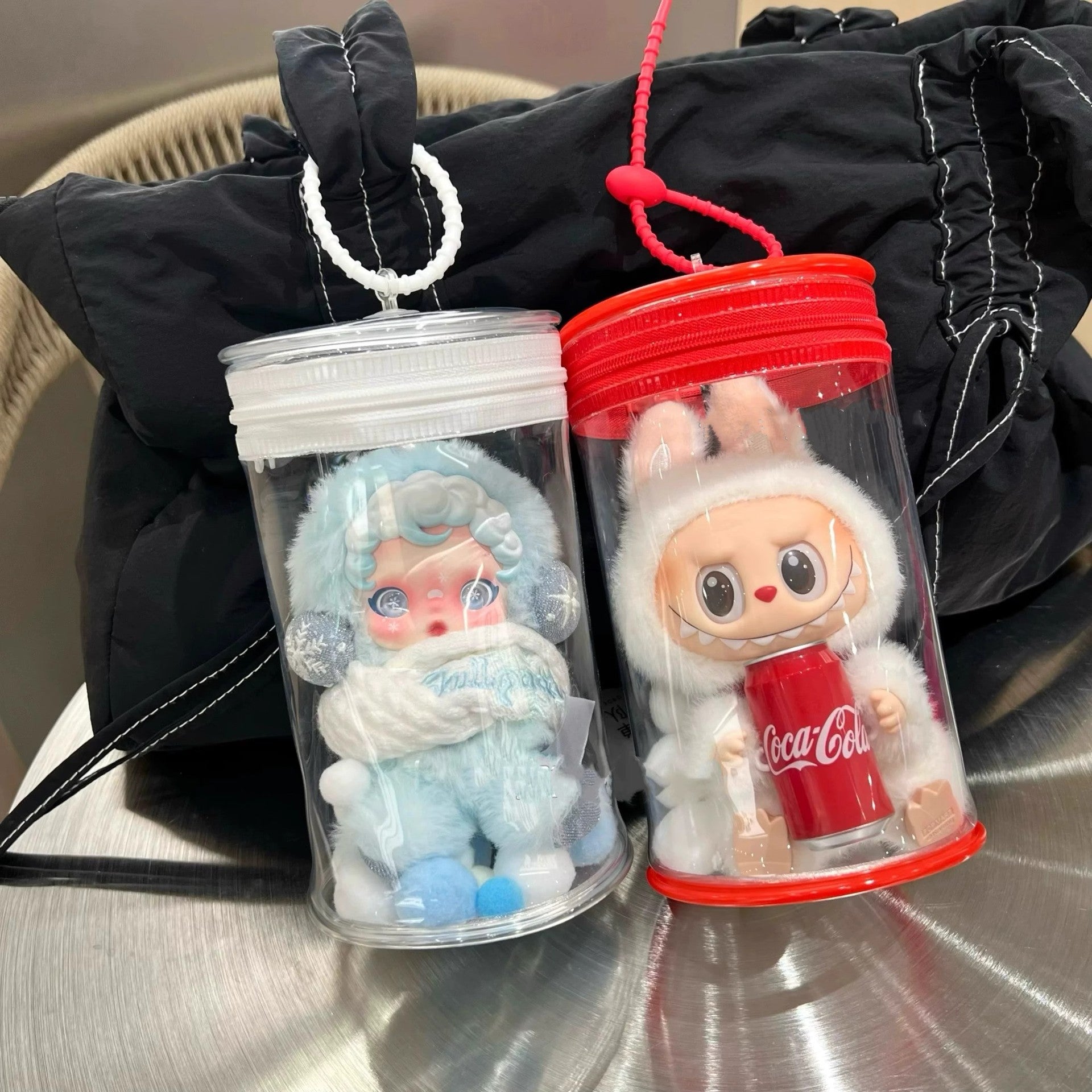 Bolsa Protectora para Labubu colección Coca-Cola:Transparente, tubular y Ovalada.