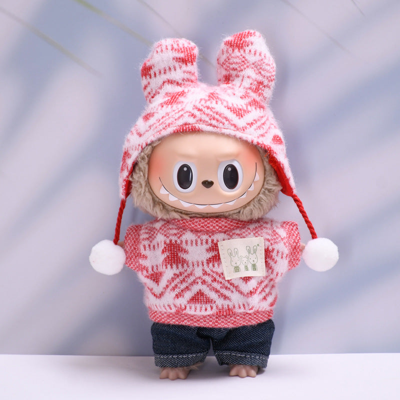 Conjunto rosa tejido con gorro de pompón y suéter para muñeca Labubu. Compatible con figuras de 17cm, ideal para colección.