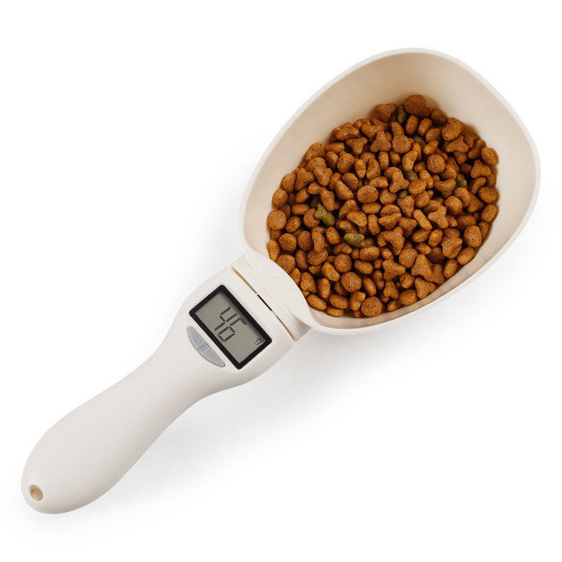 Báscula electrónica y cuchara medidora digital para comida de perros y gatos.