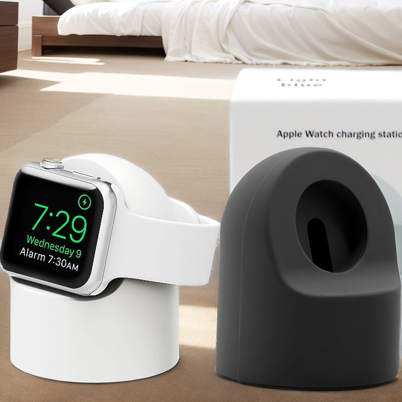 Cargador inalámbrico de silicona para Apple Watch sobre escritorio