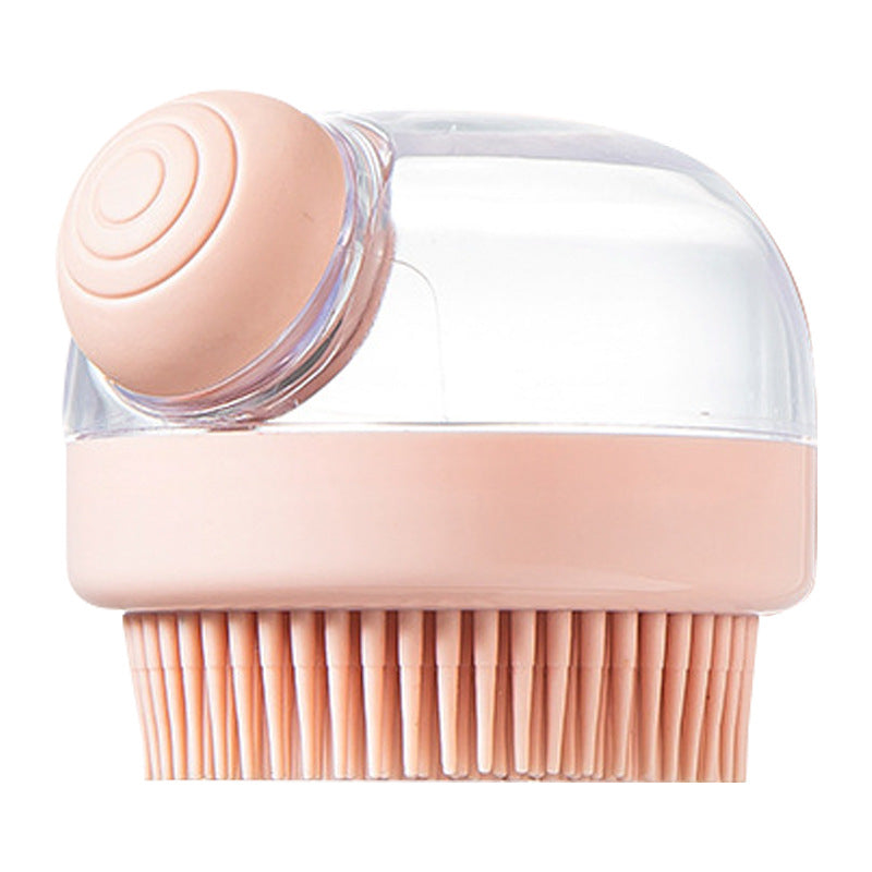 Cepillo de baño de silicona en color rosa con cerdas suaves. Accesorio ideal para el aseo y masaje de perros y gatos.