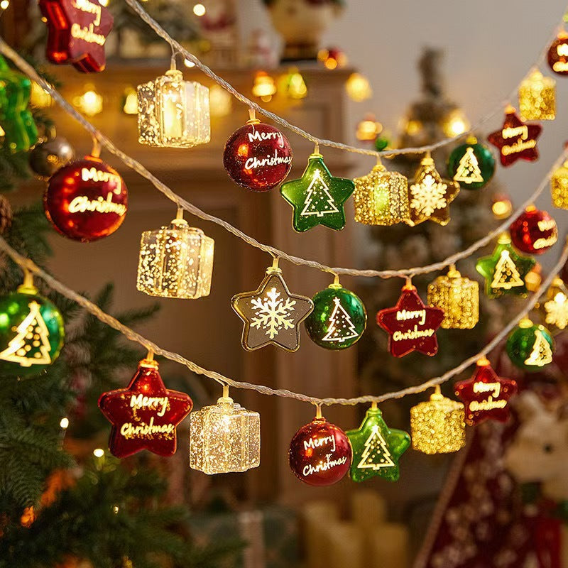 Luces LED navideñas con figuras perforadas