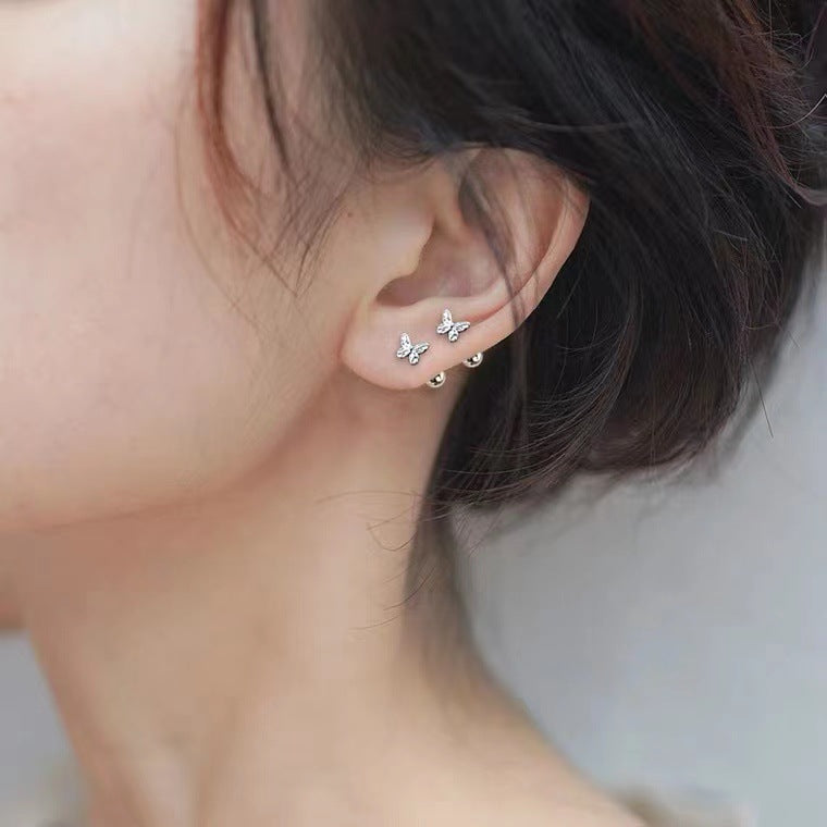 Piercing de Mariposa Pequeña en Plata 999 con Diseño Retro