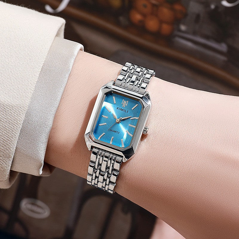 Reloj de mujer cuadrado acabado metálico vista superior