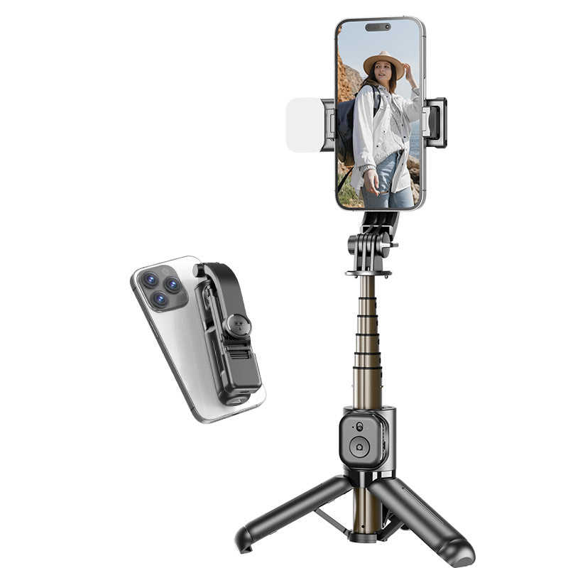 Mini Trípode Selfie Q20 con Bluetooth extendido con smartphone montado, ideal para fotos de viaje y videollamadas. Diseño portátil y ajustable.