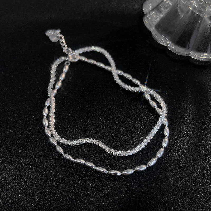 Pulsera doble cadena con brillantes – diseño joven y delicado para mujer