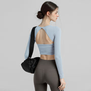 Top de yoga de manga larga para mujer