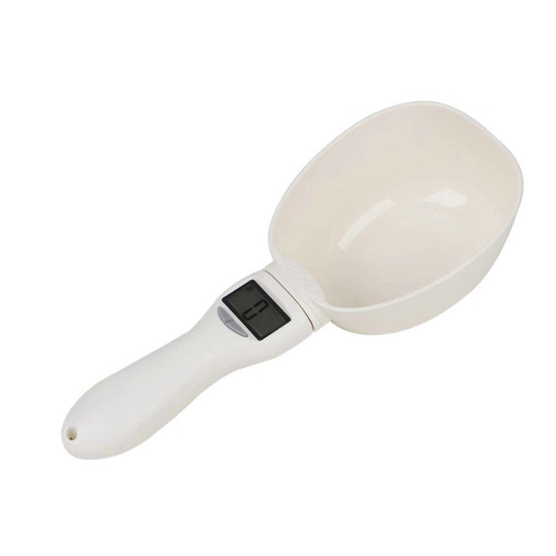 Báscula electrónica y cuchara medidora digital para comida de perros y gatos.
