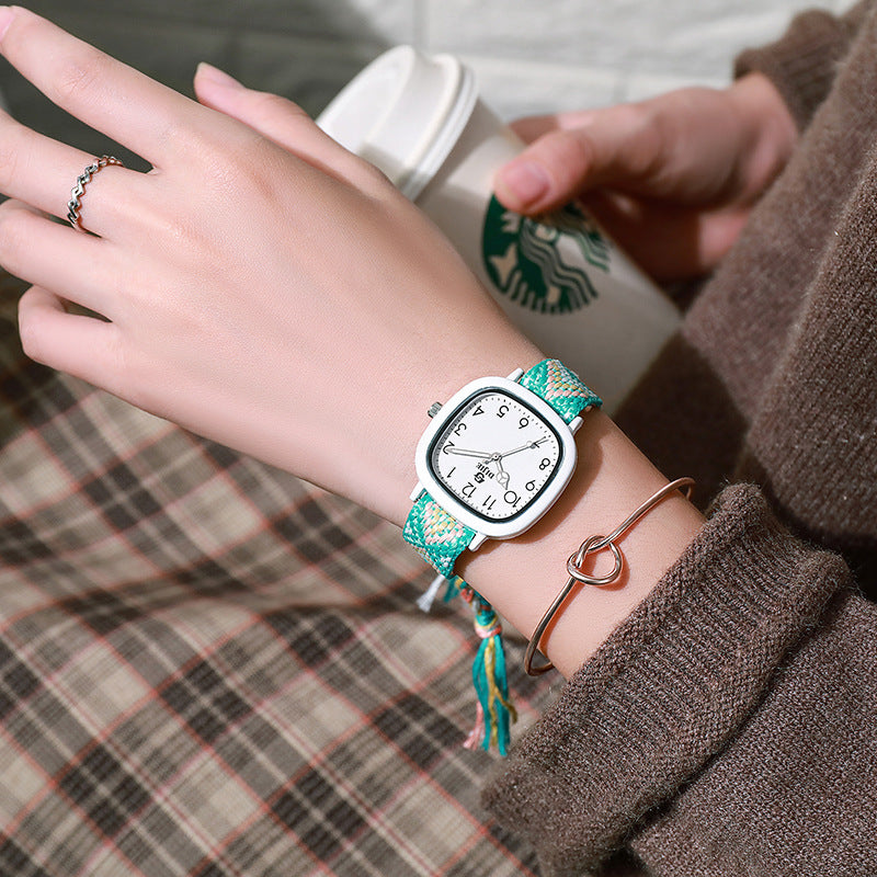 Reloj Juvenil Unisex con Manilla Tejida Disponible en Varios Colores