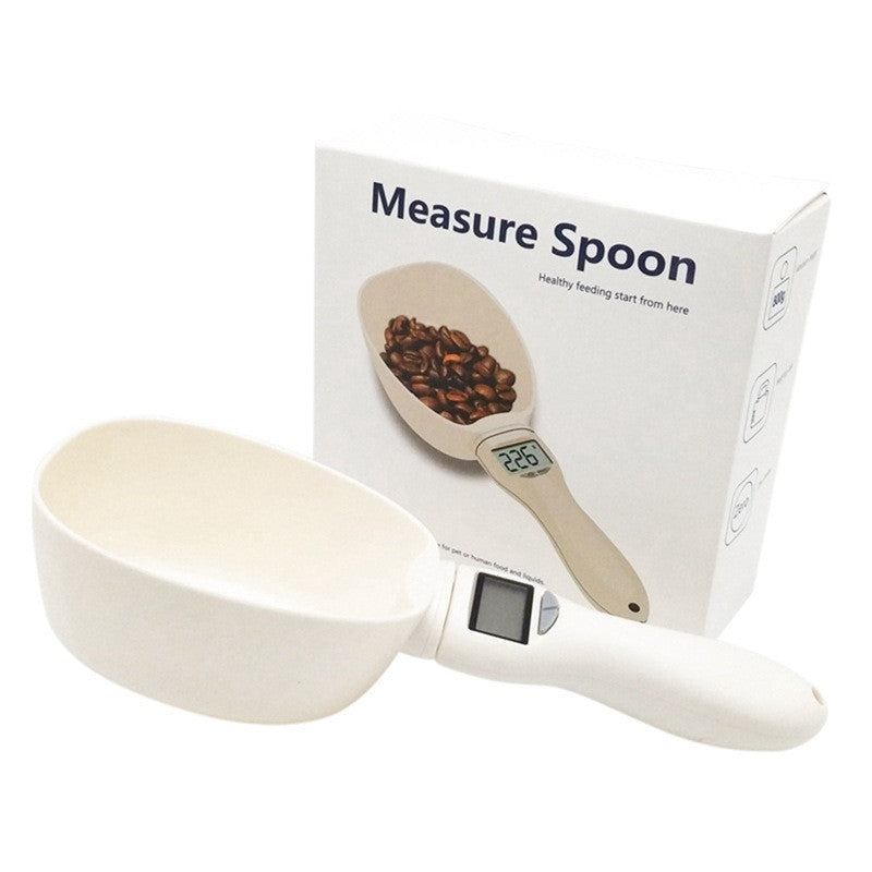 Báscula electrónica y cuchara medidora digital para comida de perros y gatos.