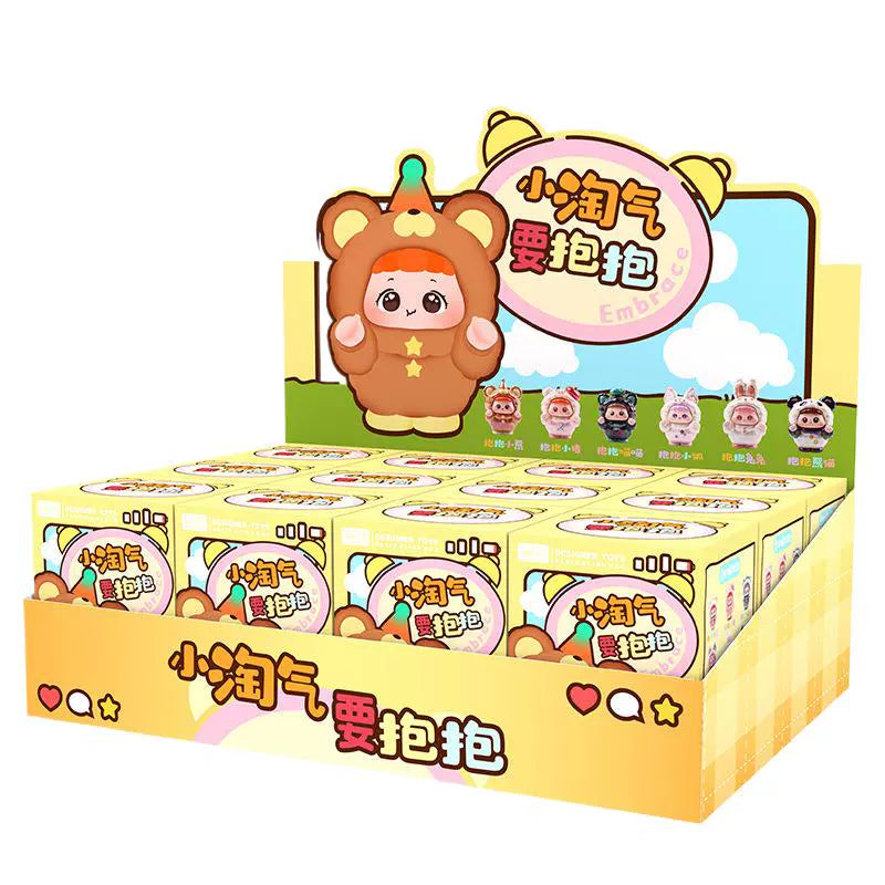 Muñecos Coleccionables Serie Pequeña Traviesa Quiere Un Abrazo – Caja Sorpresa