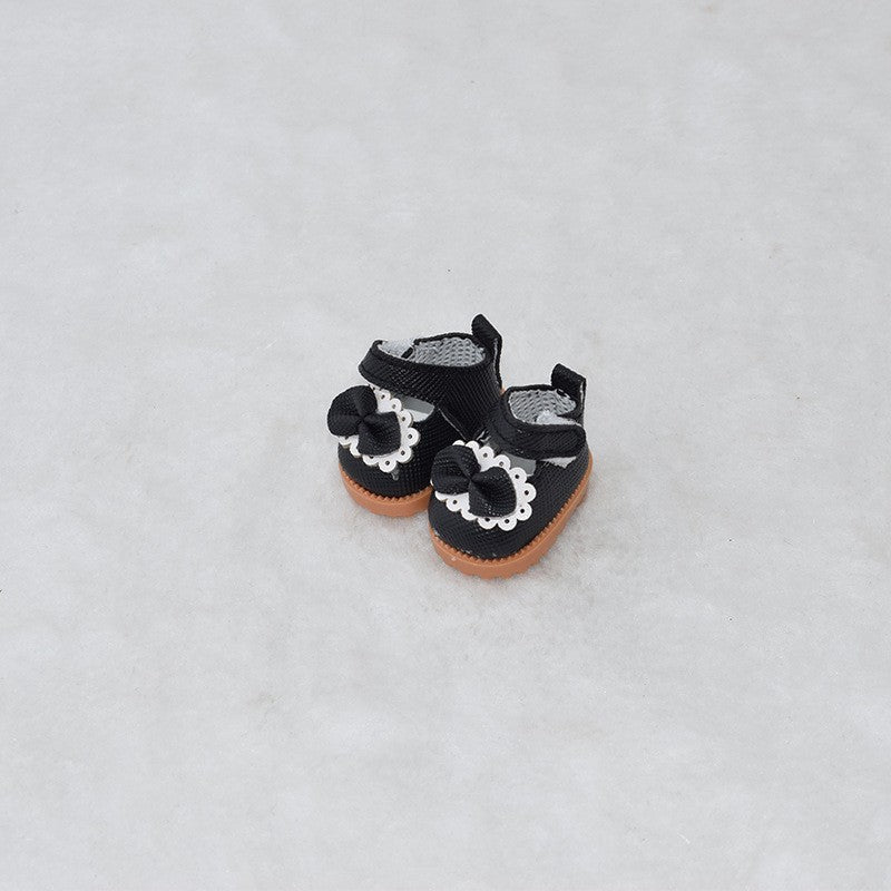 Zapatos negros con lazo decorativo para muñecos Labubu de 17CM, parte de la colección de accesorios para muñecos coleccionables.