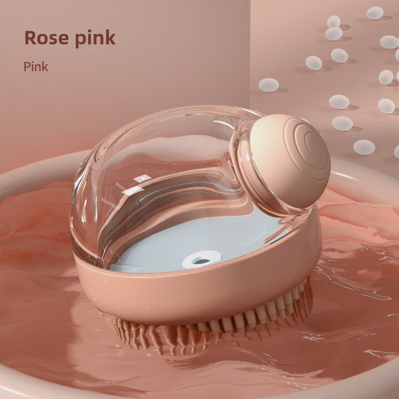 Cepillo de baño de silicona en tono rosa con diseño ergonómico. Perfecto para el aseo de perros y gatos con masaje relajante.