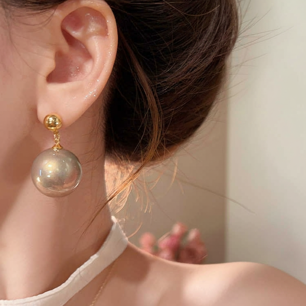 Aretes de perla geométricos con baño de oro 18k - 2