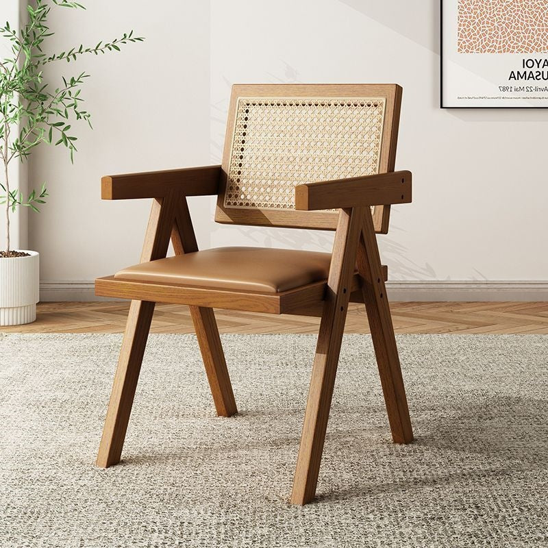 Silla de comedor nórdica de madera con respaldo de ratán