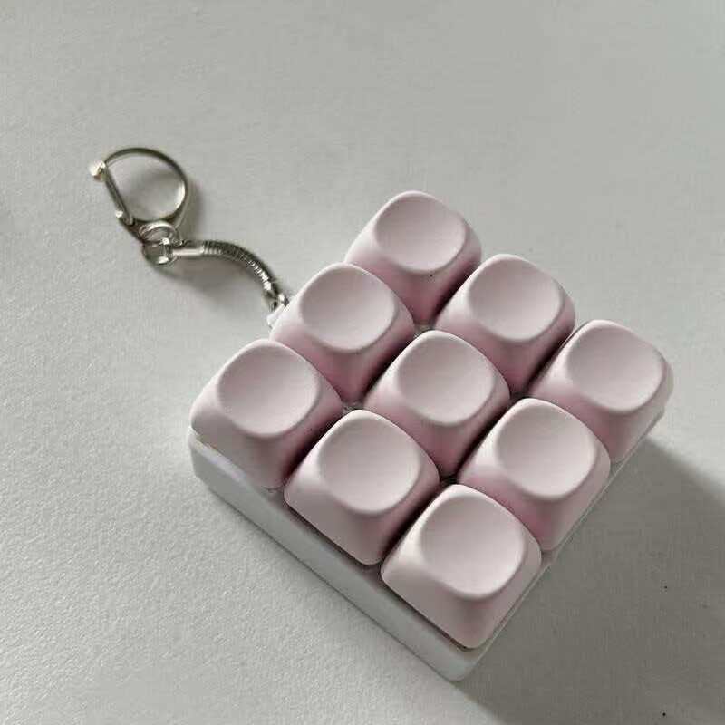 Llavero Antiestrés Teclado Mecánico Macaron con Luz