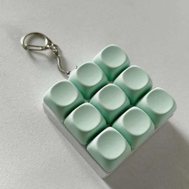 Llavero Antiestrés Teclado Mecánico Macaron con Luz
