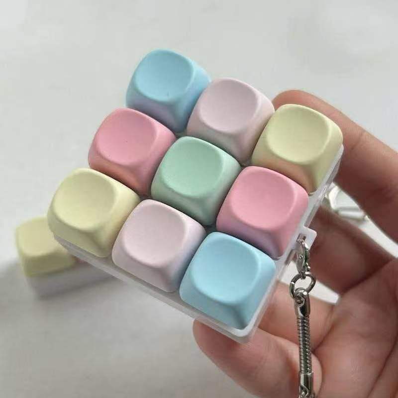 Llavero Antiestrés Teclado Mecánico Macaron con Luz