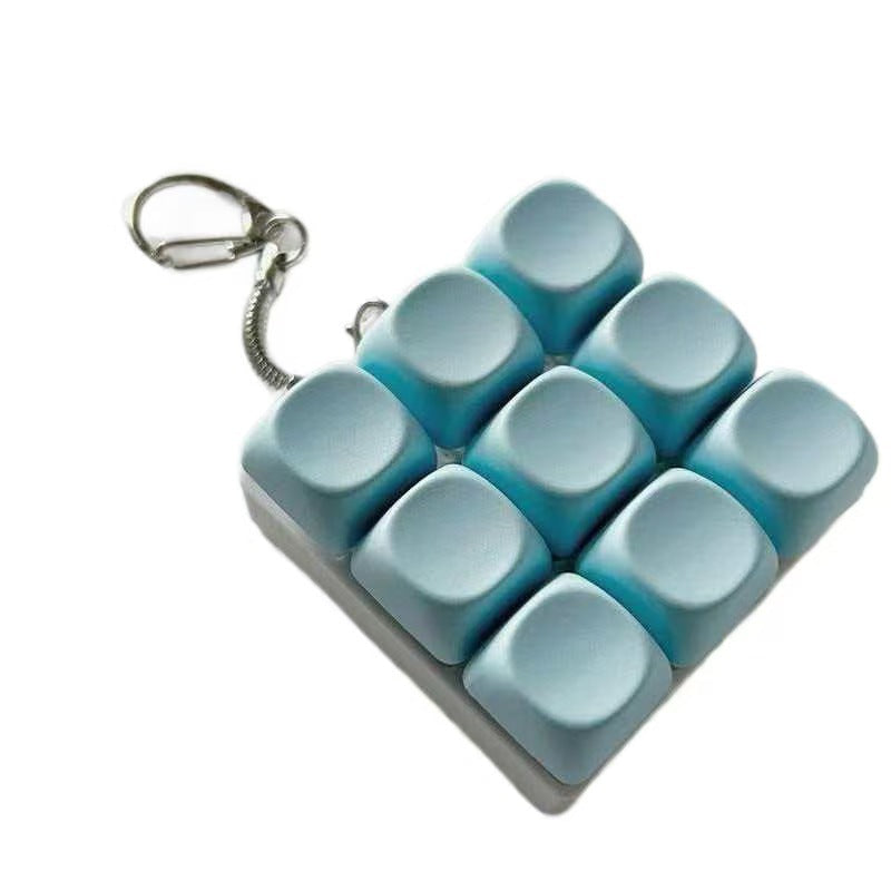 Llavero Antiestrés Teclado Mecánico Macaron con Luz