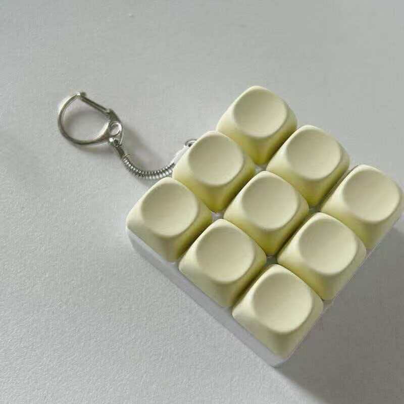 Llavero Antiestrés Teclado Mecánico Macaron con Luz