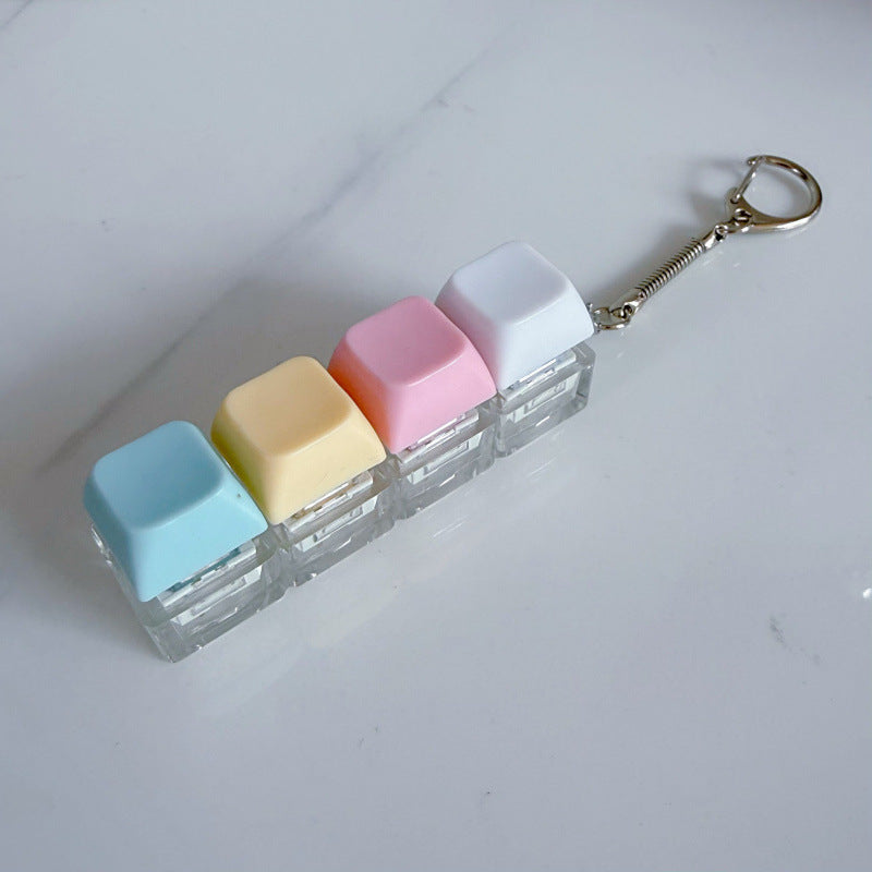 Llavero antiestrés de tecla de teclado macarón