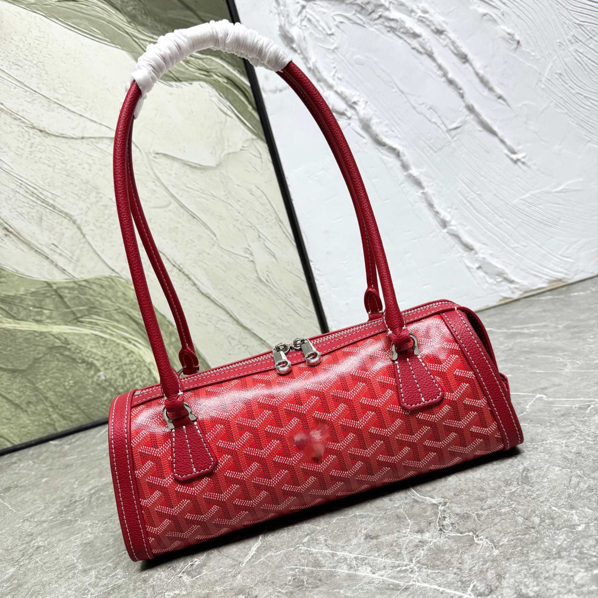 Bolsa cilíndrica de piel estilo retro con costuras decorativas