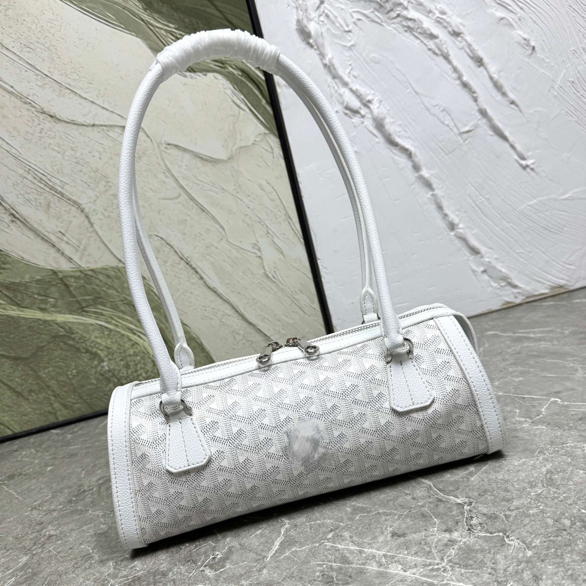 Bolsa cilíndrica de piel estilo retro con costuras decorativas