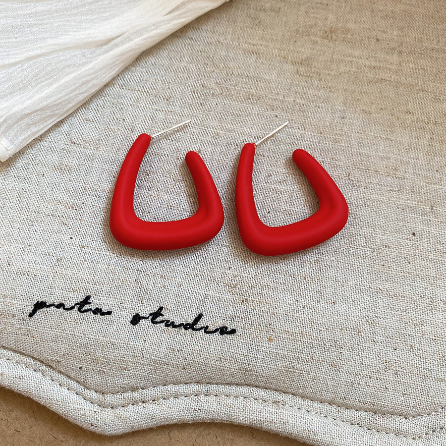 Aretes geométricos en C colores candy acero 925