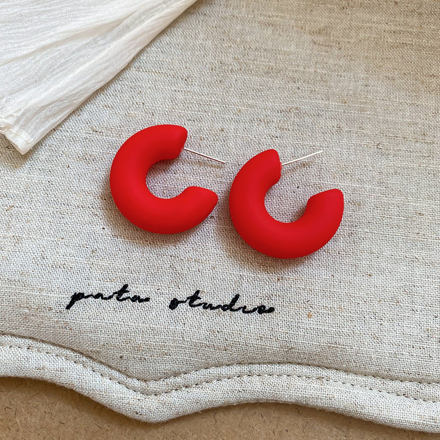 Aretes geométricos en C colores candy acero 925