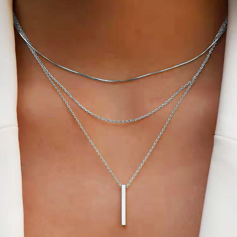 Collar largo multicapa geométrico estilo minimalista