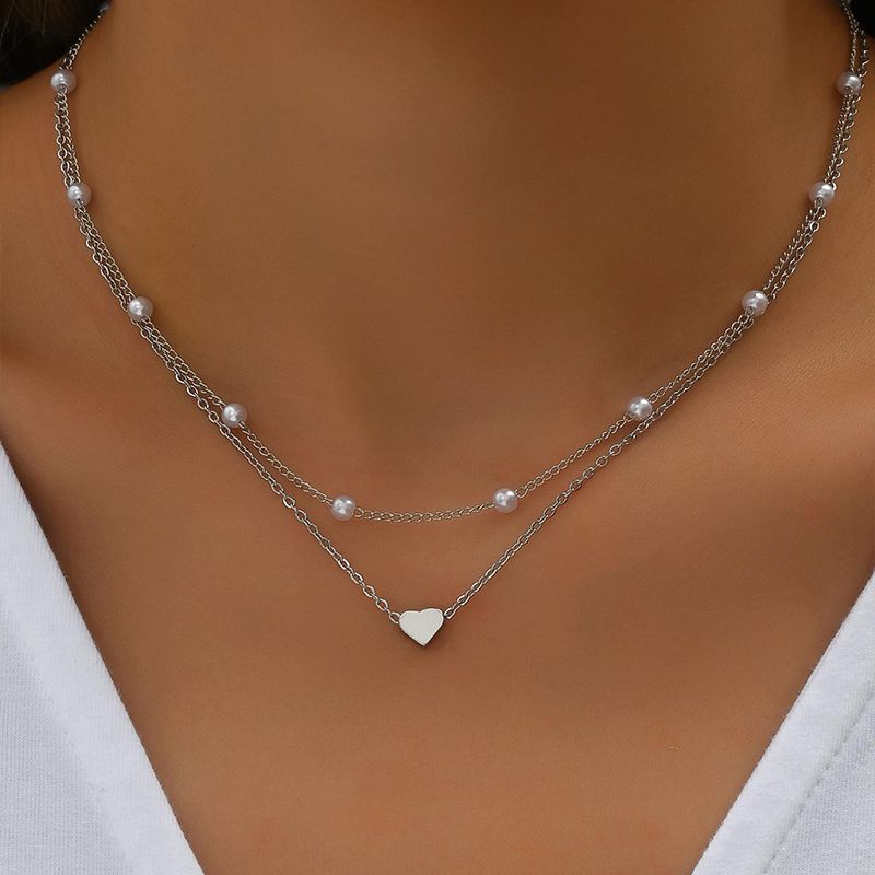 Collar con dije de corazón y perla - 12