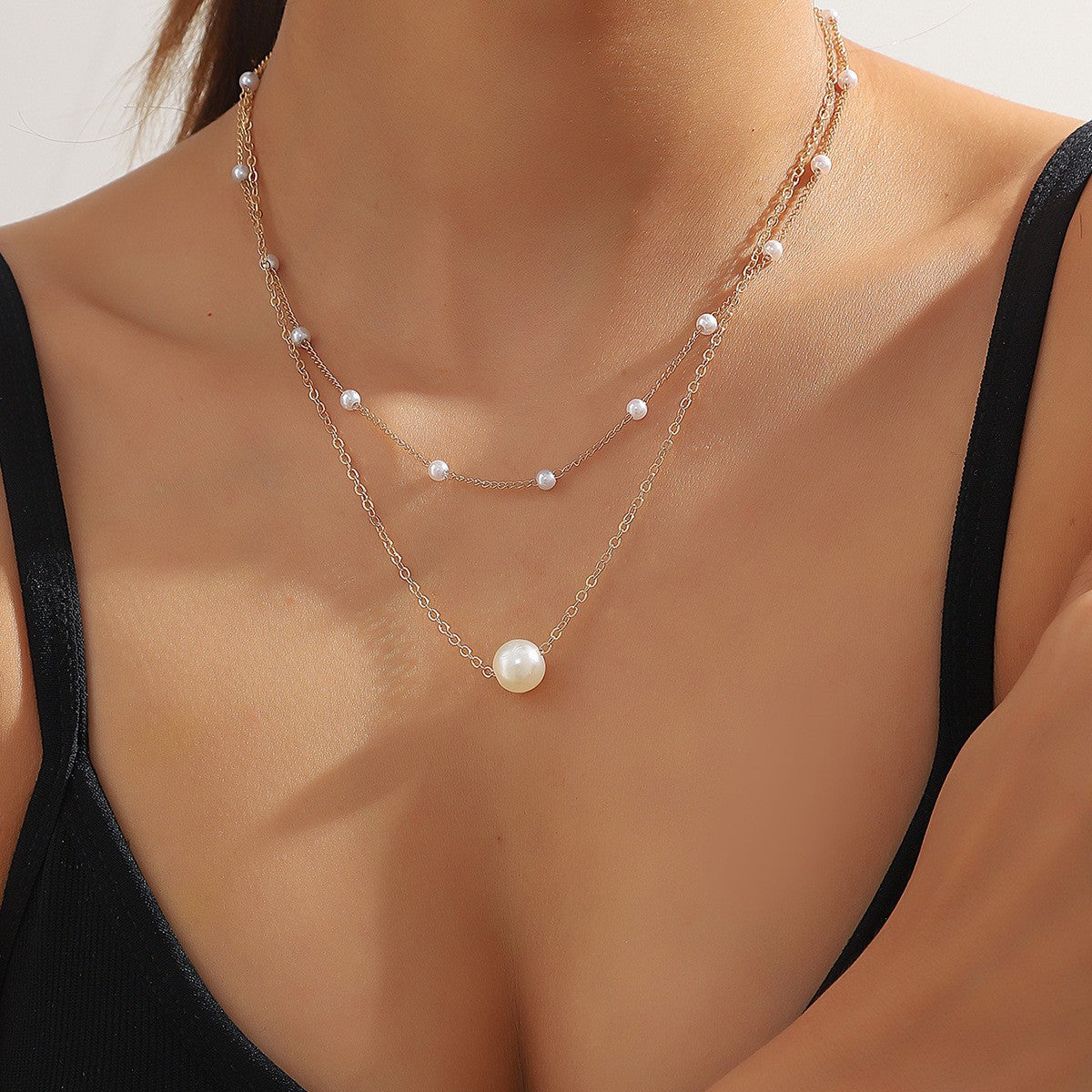 Collar con dije de corazón y perla - 15