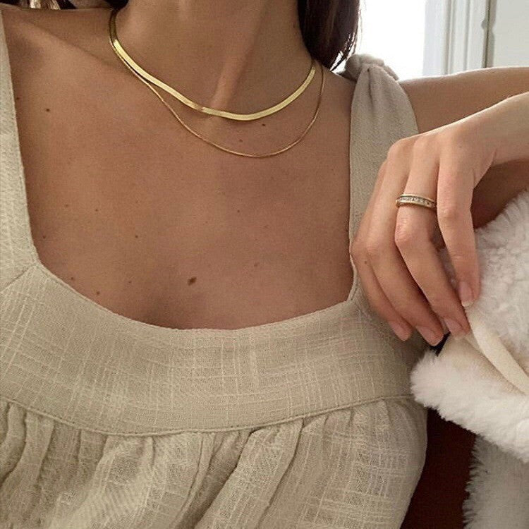 Collar con dije de corazón y perla