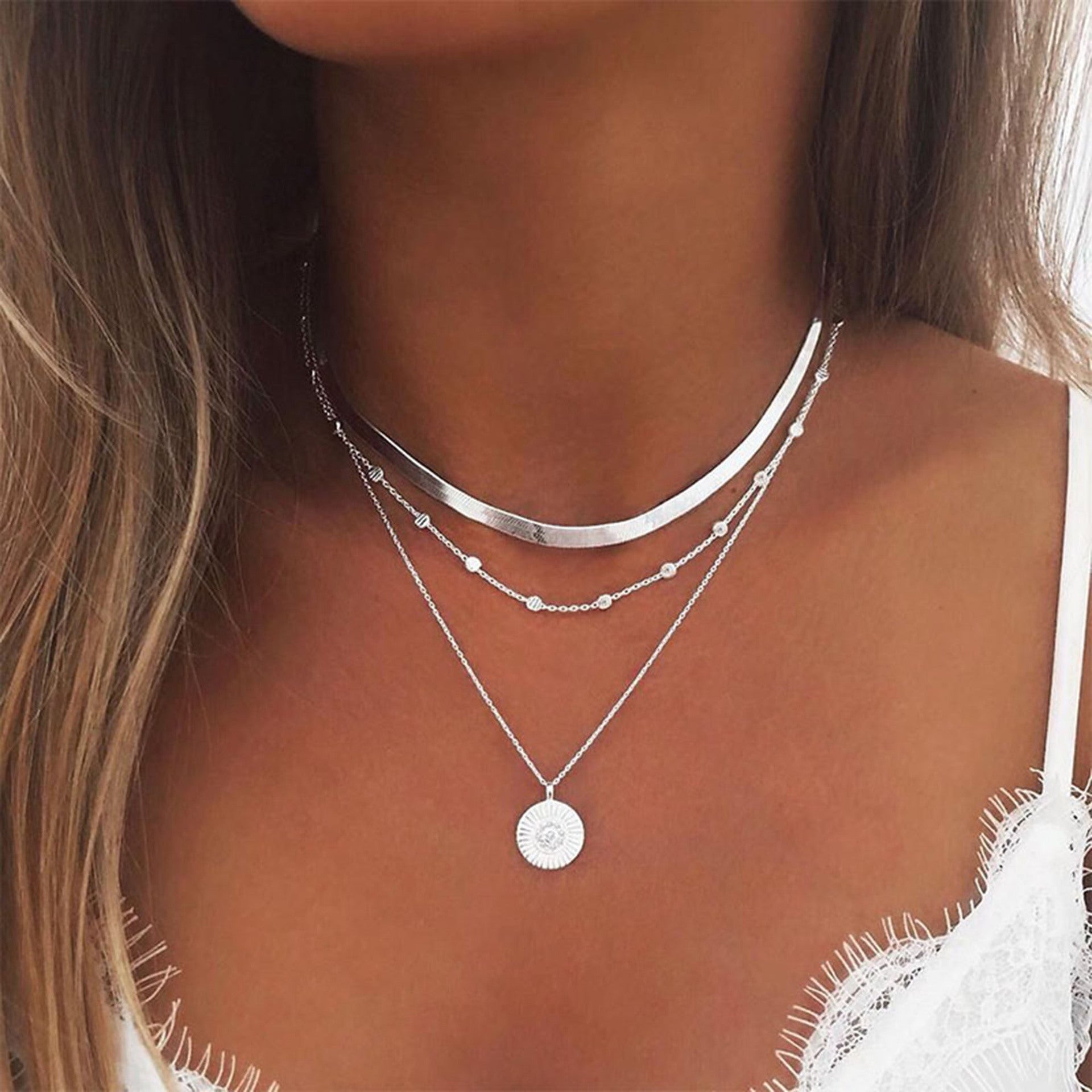 Collar con dije de corazón y perla