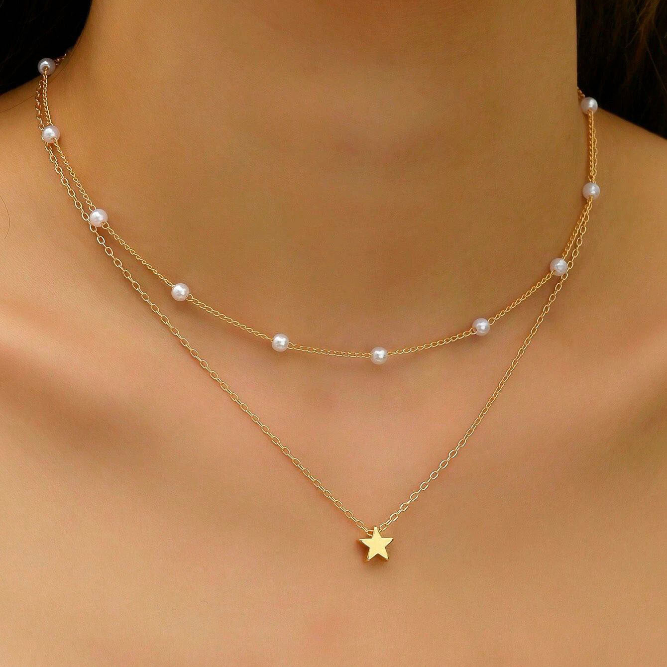 Collar con dije de corazón y perla
