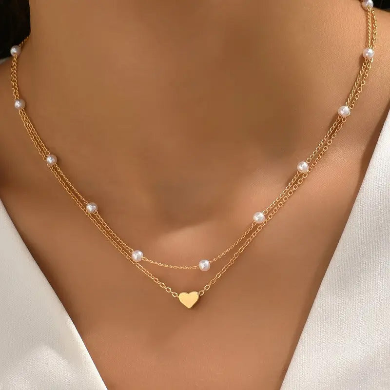 Collar con dije de corazón y perla