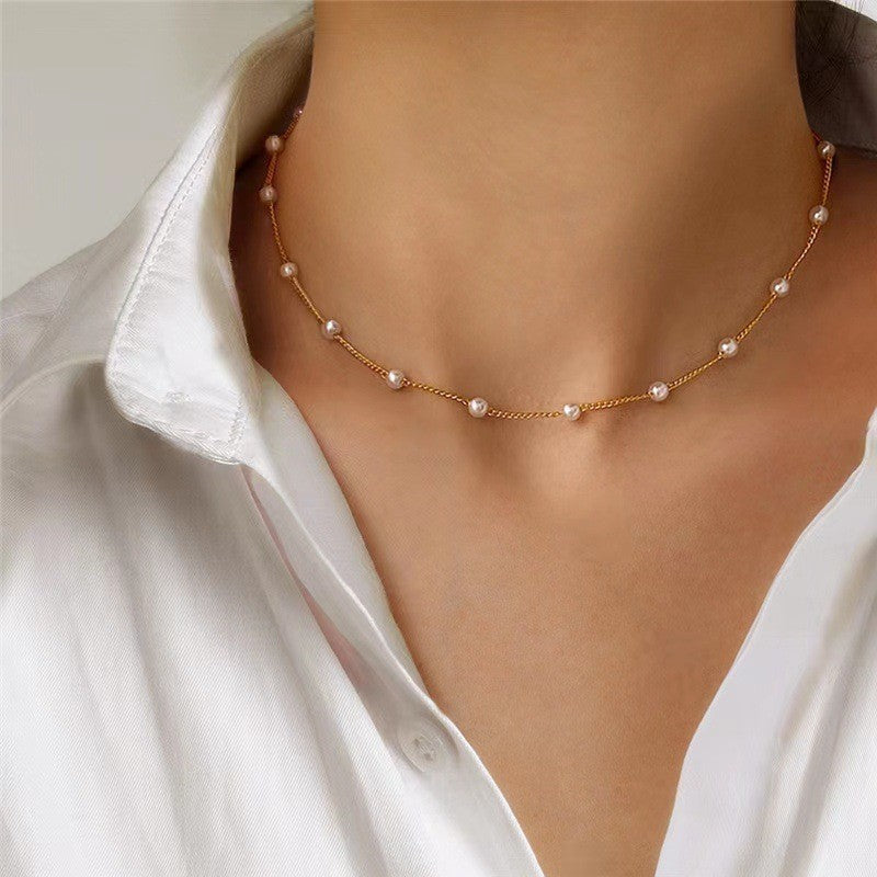 Collar con dije de corazón y perla