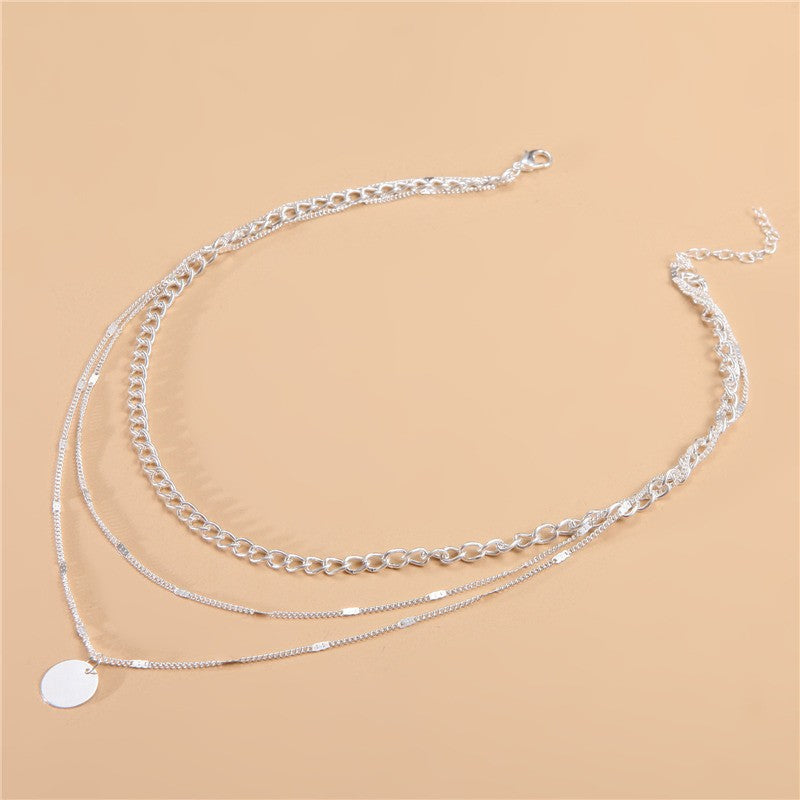 Collar con dije de corazón y perla