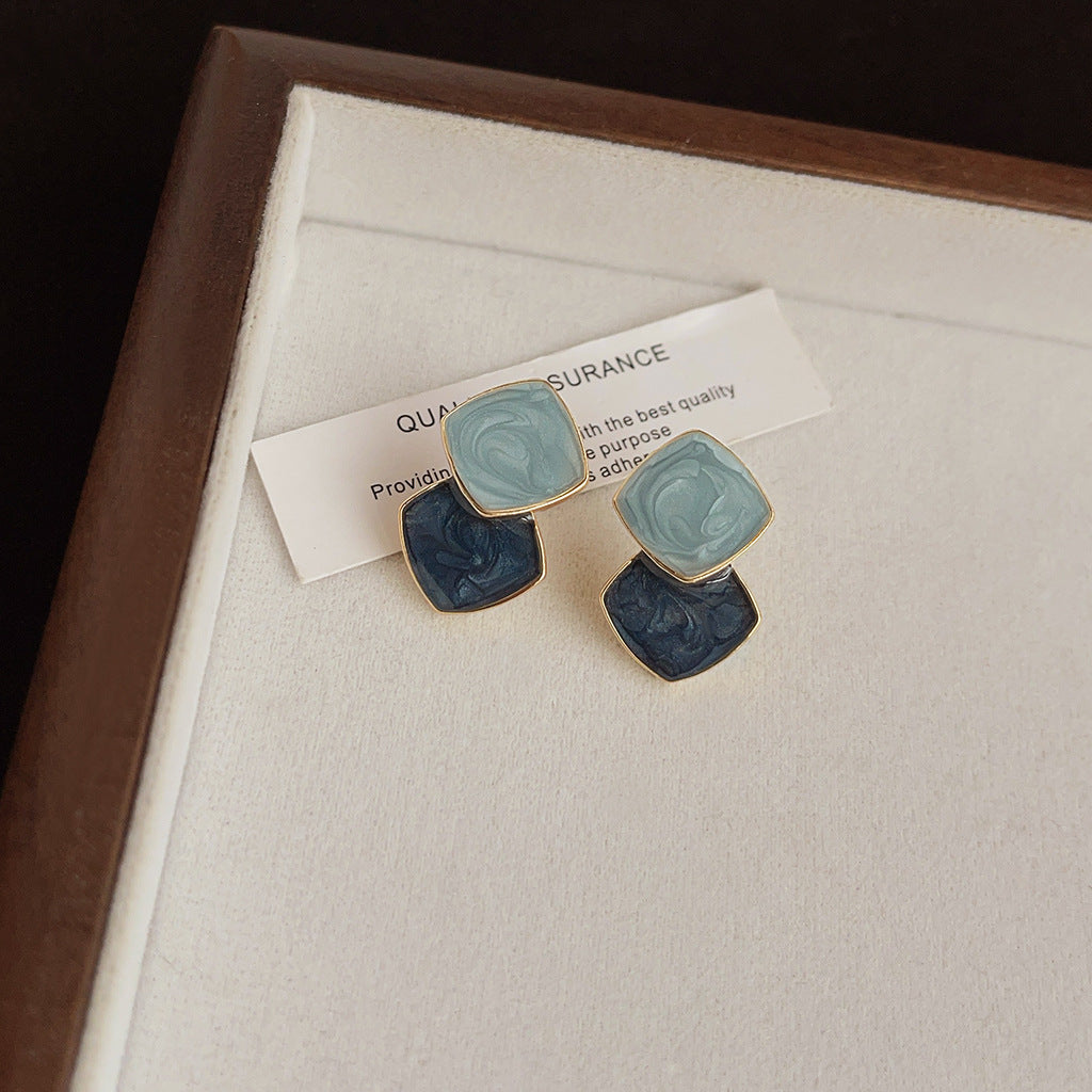 Aretes de cobre con esmalte geométrico azul para mujer