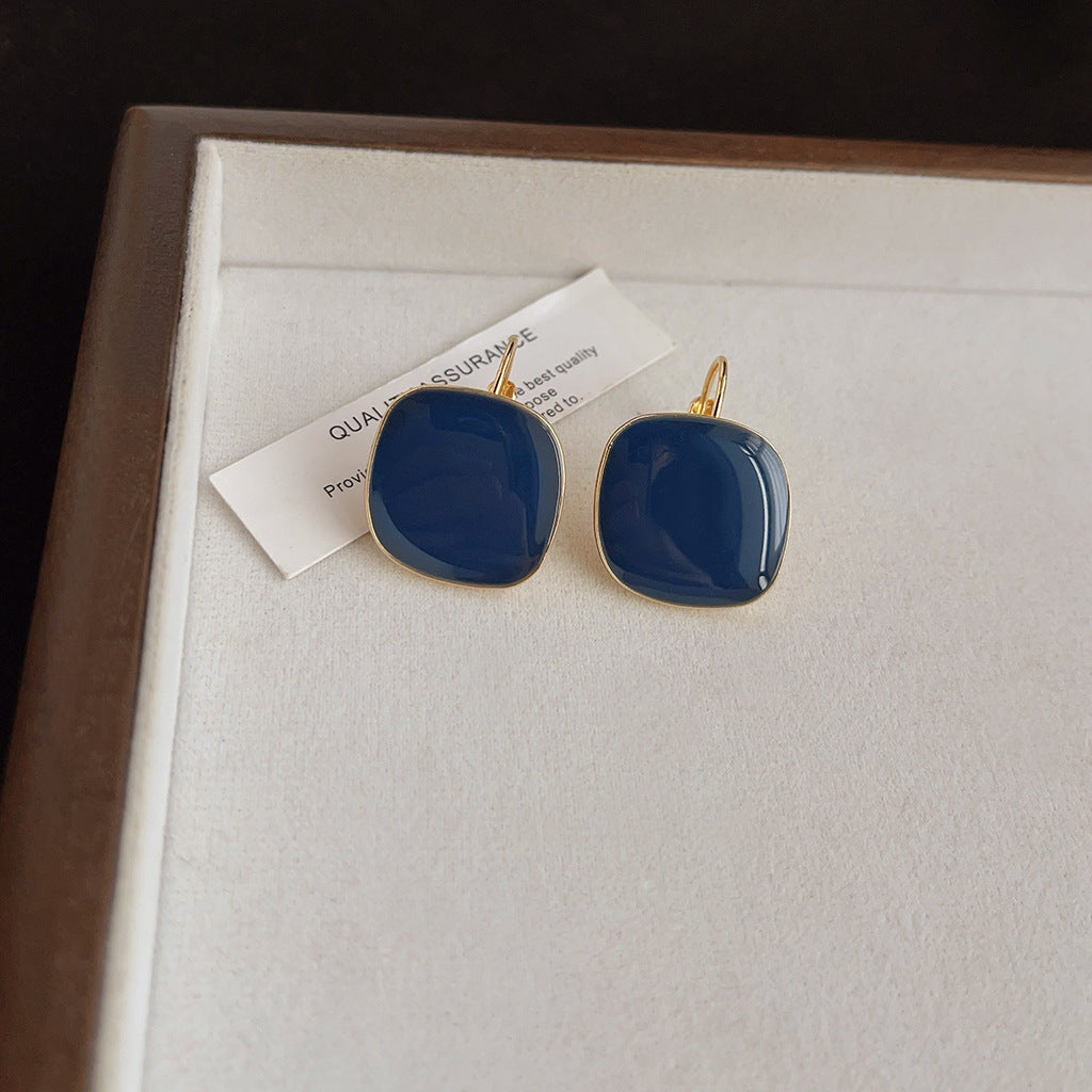 Aretes de cobre con esmalte geométrico azul para mujer