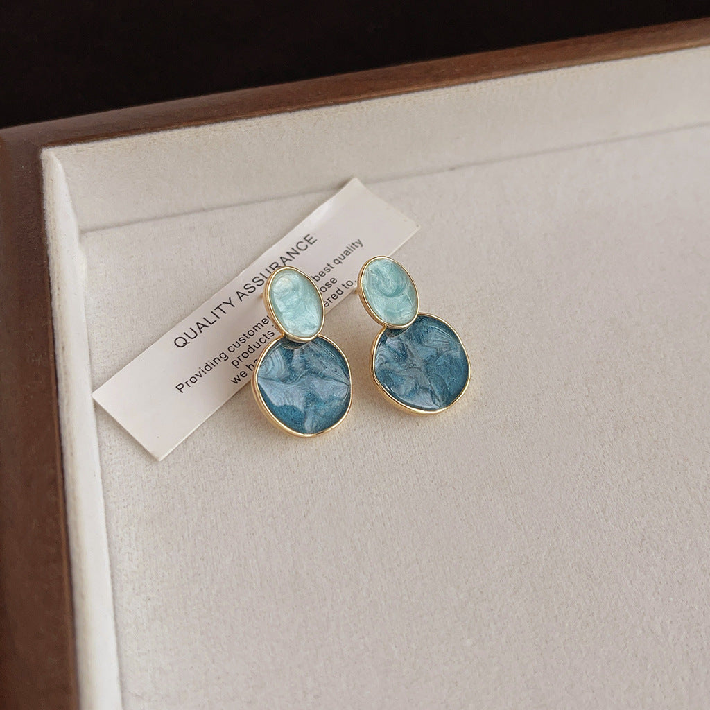 Aretes de cobre con esmalte geométrico azul para mujer