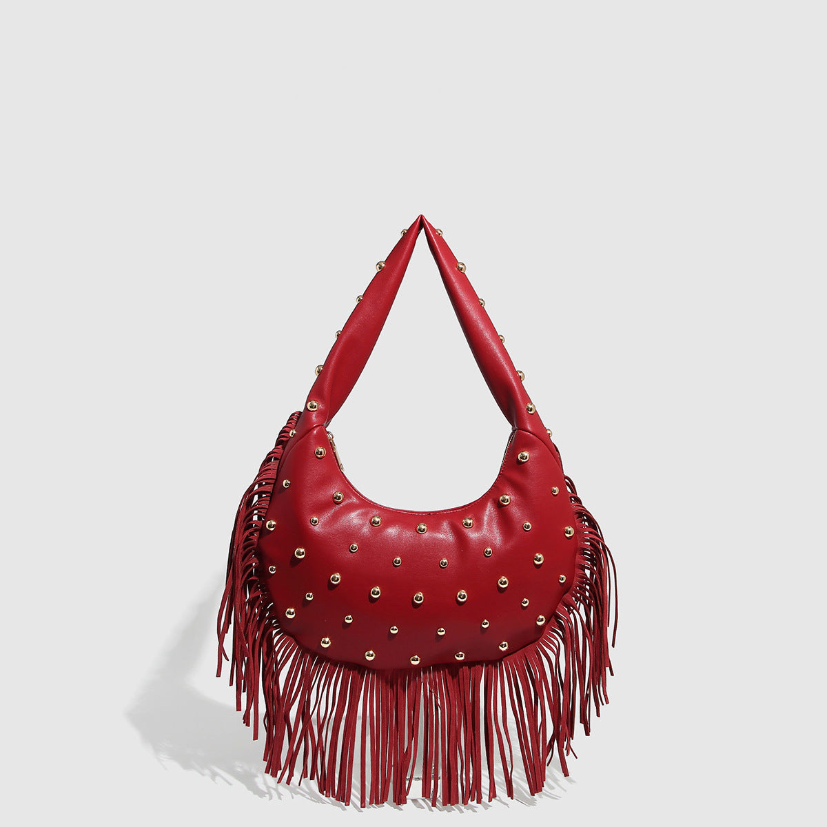 Bolsa con tachuelas y flecos mujer