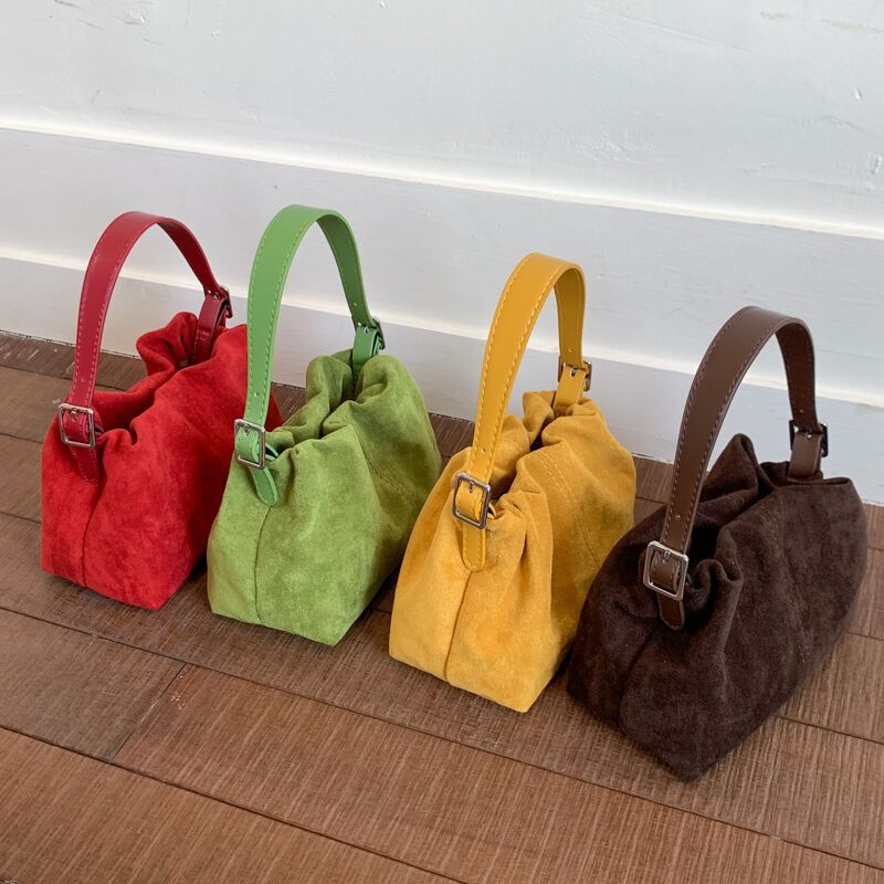 Bolsa tipo bucket moda urbana con correa cruzada - 1
