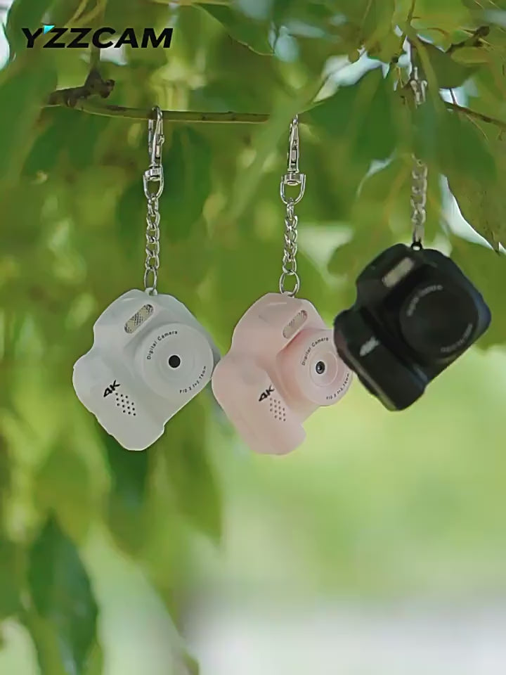 Cargar vídeo: Mini cámara digital de bolsillo con llavero