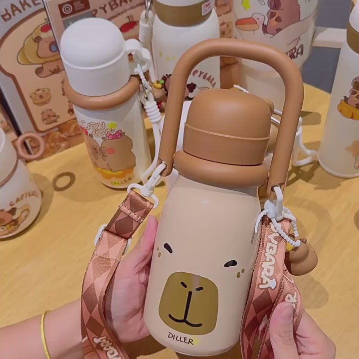 Load video: Capybara 316L Straw Thermos Cup: New High-Value Design for Children and Students, Portable Flip-Top Dual-Use Water Cup