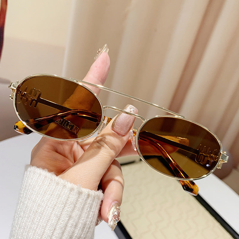 varimg:824712083430:armazon-dorado-con-lentes-cafe