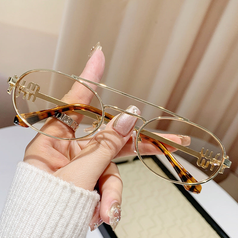 varimg:824712083430:armazon-dorado-con-lentes-champagne