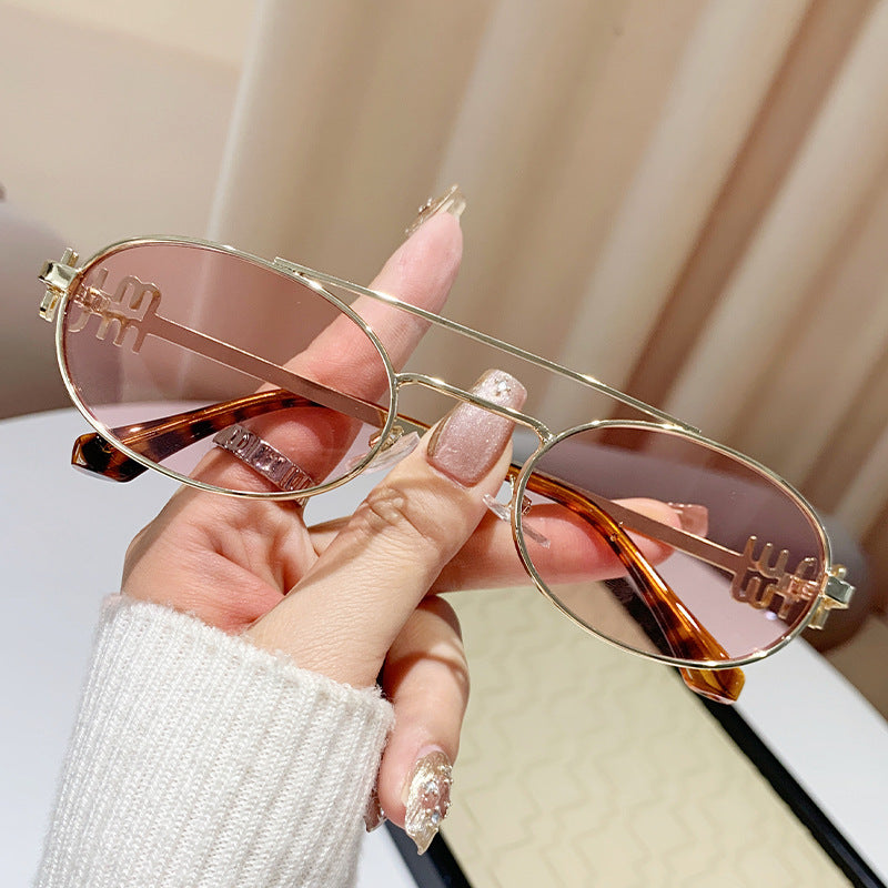 varimg:824712083430:armazon-dorado-con-lentes-rosas